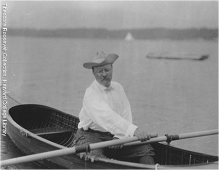 Theodore Roosevelt rowing a row boat